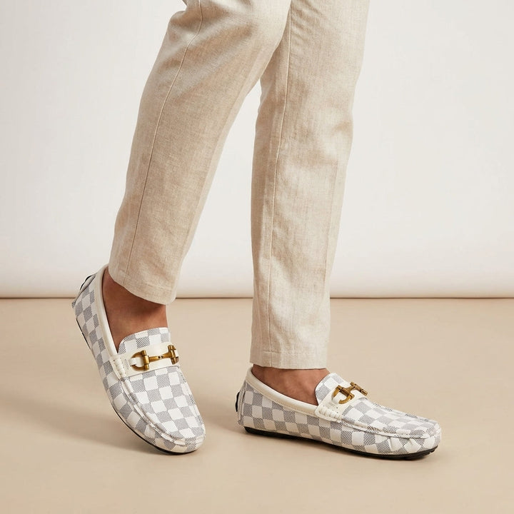 Side view of men's slip-on loafers, showcasing sleek design & comfortable sole for casual everyday wear.