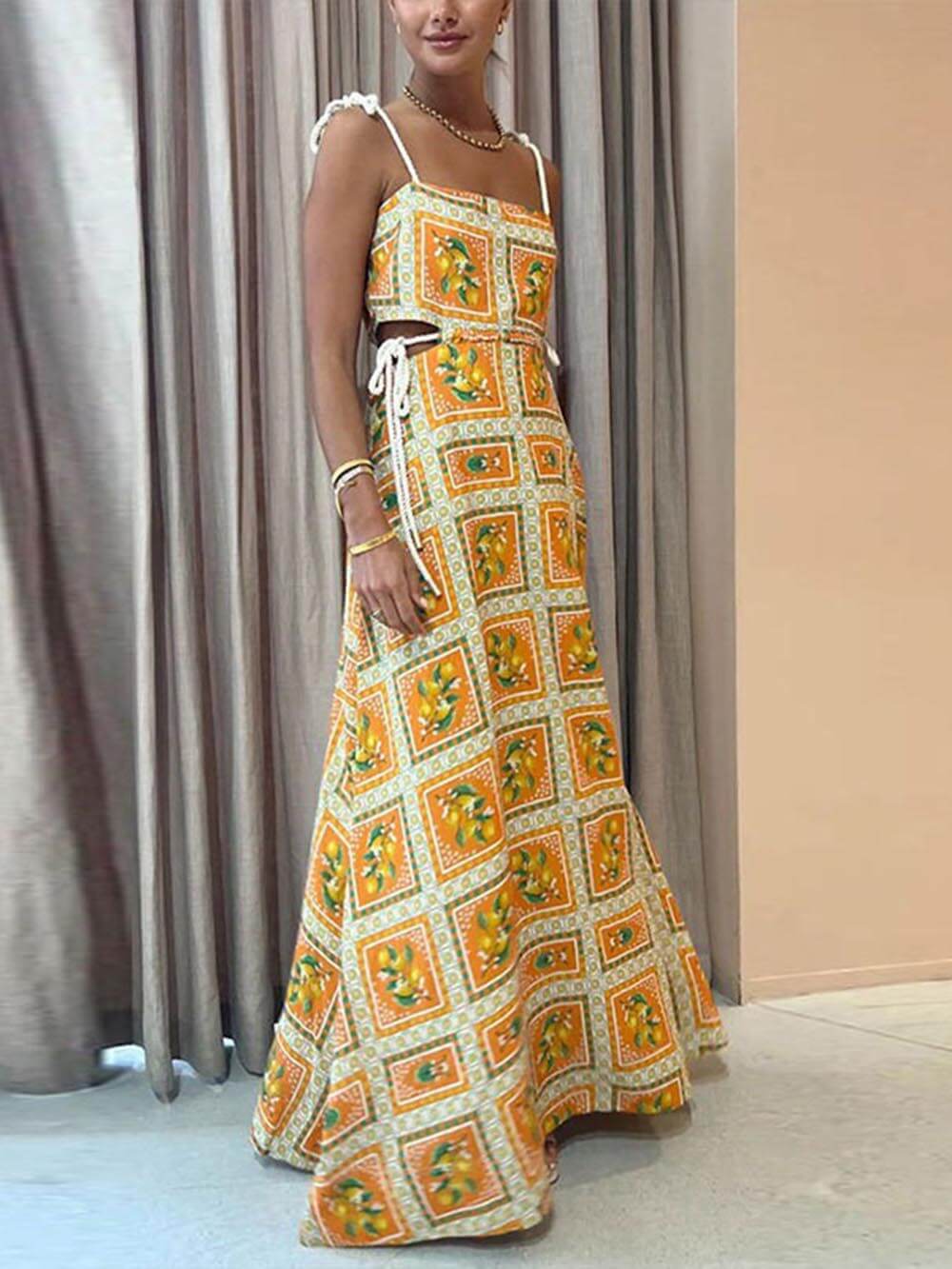 Boho women's orange flowy maxi dress, a casual square neck sundress ideal for warm summer days.