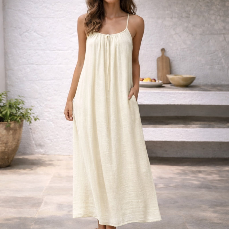 Delicate spaghetti strap maxi sundress for women, an elegant long dress for summer events.