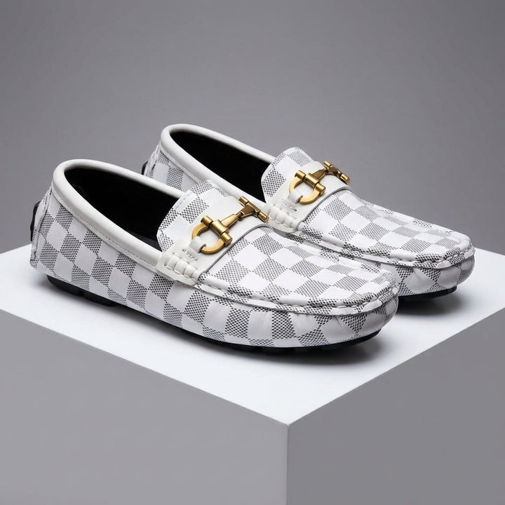 Assortment of men's slip-on loafers (black, white, brown). Stylish & comfortable casual footwear for everyday.