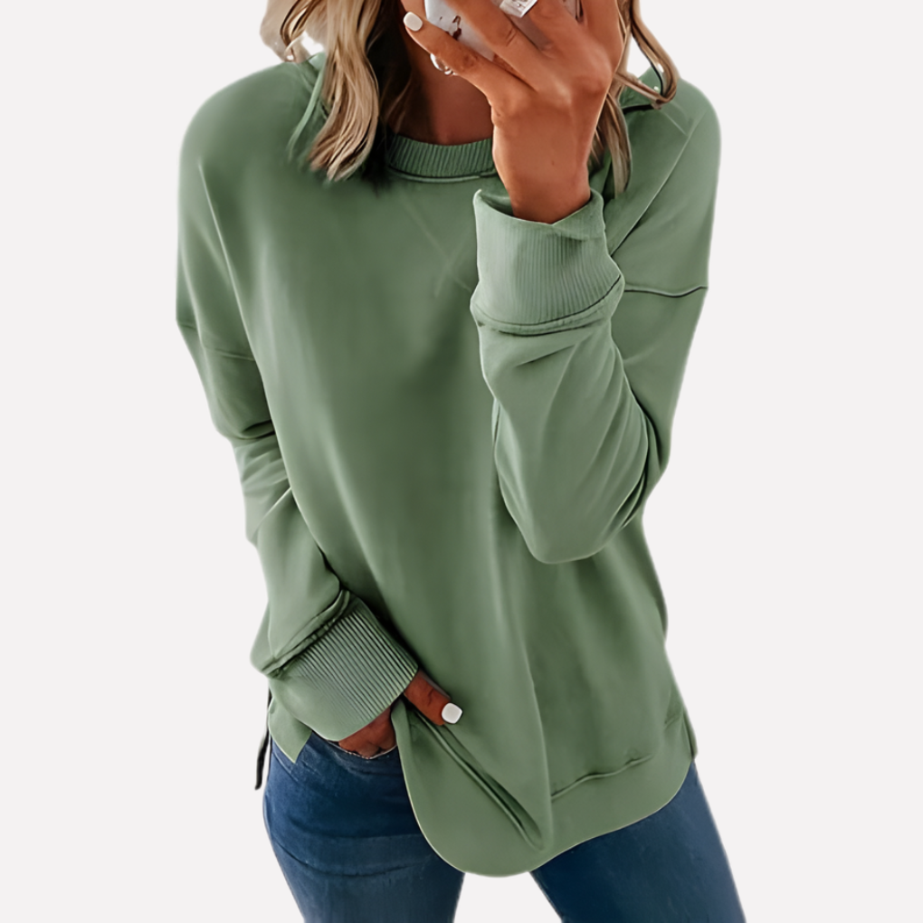 Classic women's long sleeve crew neck sweatshirt, relaxed fit, ideal for casual outfits.