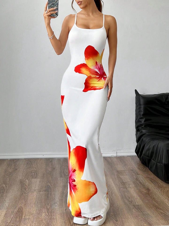 Vibrant floral women's maxi sundress with spaghetti straps, offering a casual yet chic look.