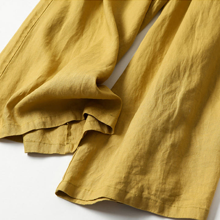 Stylish high-waist wide-leg pants for women, creating a modern workwear look.
