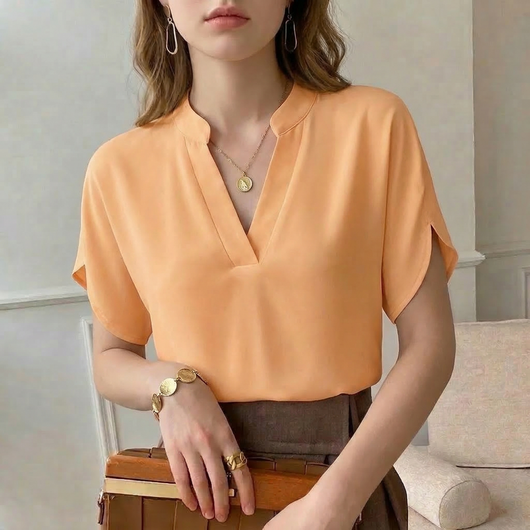 Elegant women's flowy blouse with long sleeves, perfect for versatile style, office, or casual wear.