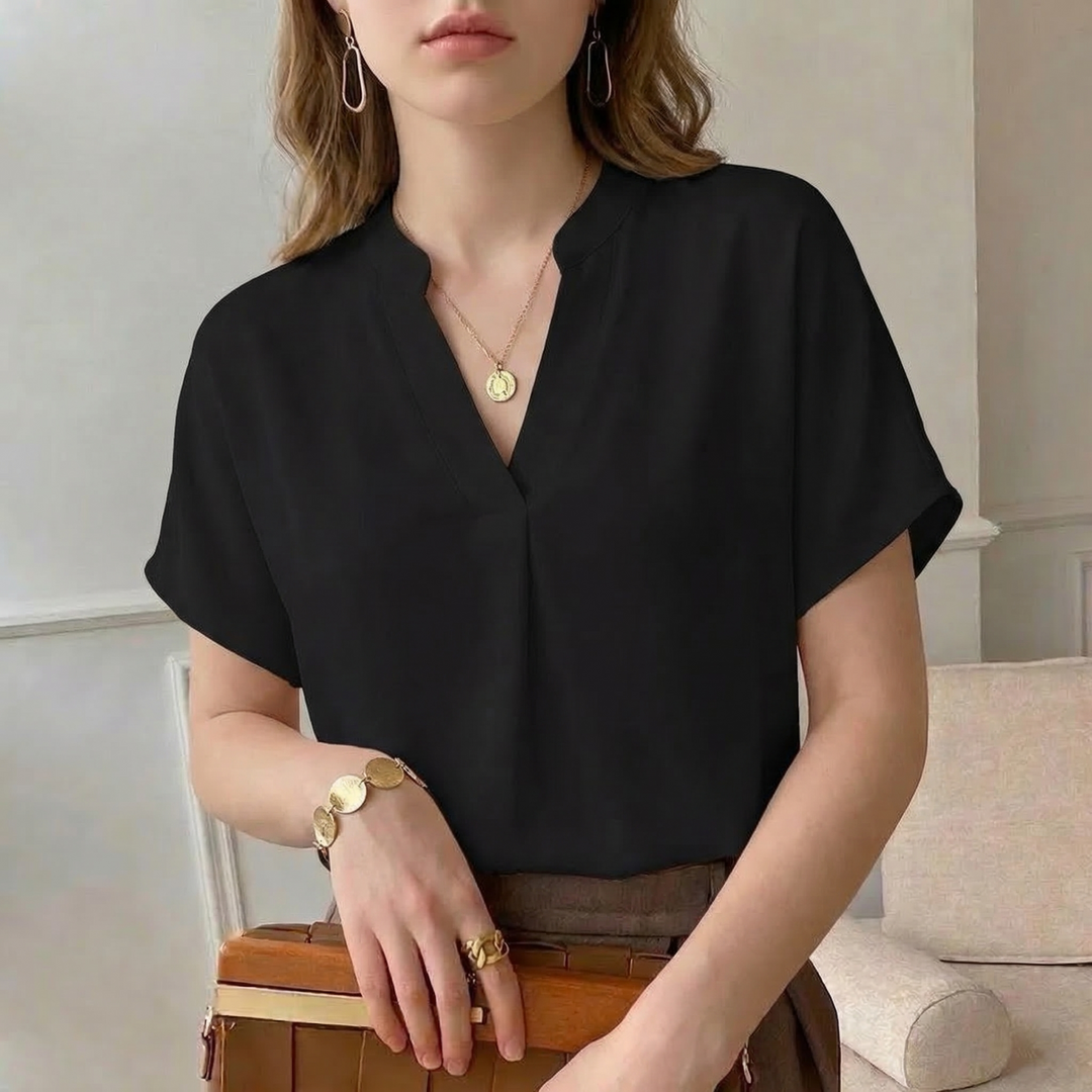 Classic style women's long-sleeve flowy blouse, an elegant top for versatile casual or professional wear.