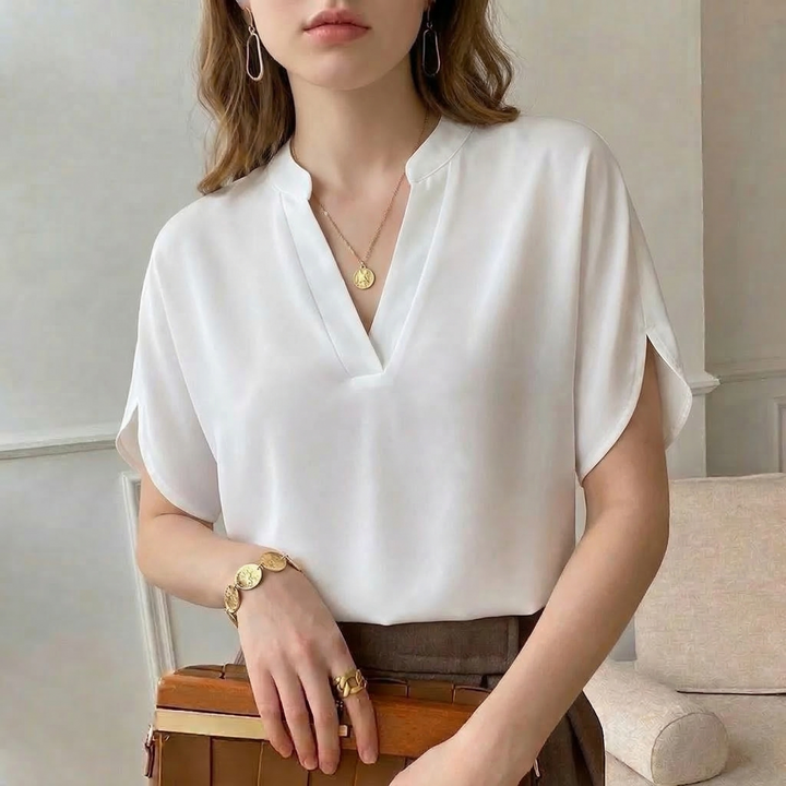 Comfortable everyday women's flowy blouse, ideal for versatile styling, casual outings, or office fashion.