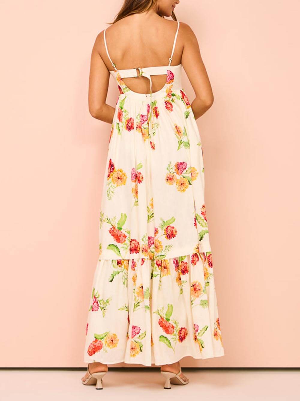 Elegant women's flowy beige maxi sundress with open-back, ideal for beach & casual summer days.