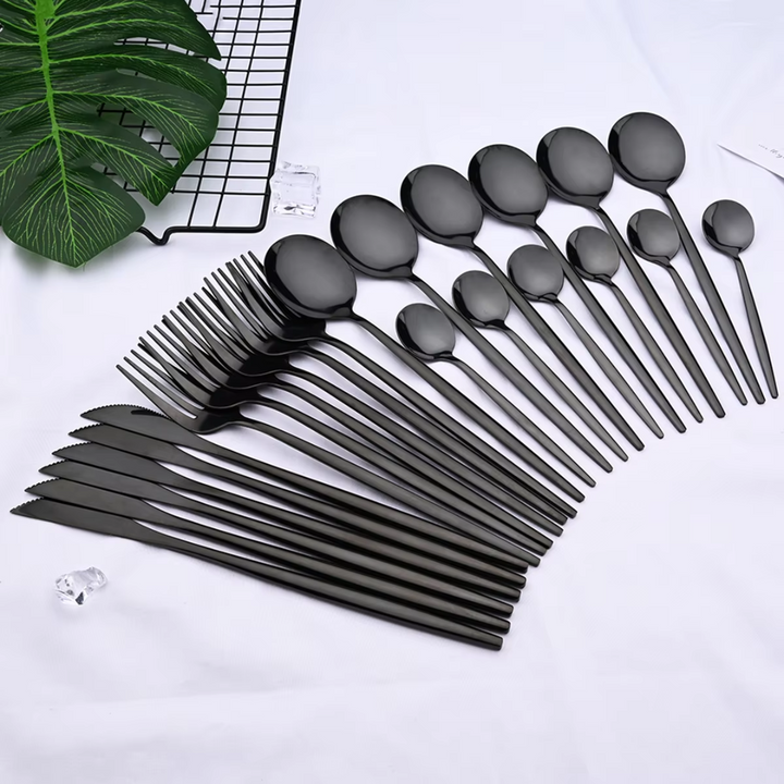 Durable black stainless steel cutlery set, 24 pieces including sharp steak knives. Perfect modern kitchen dinnerware.