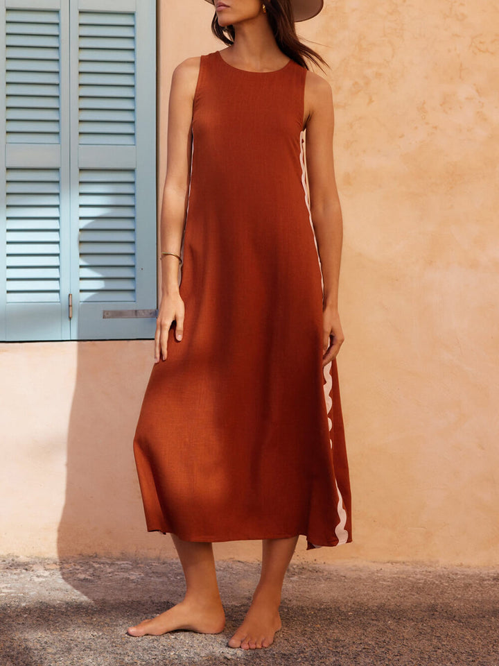 Elegant striped pleated midi sundress for women, ideal for casual or day wear.