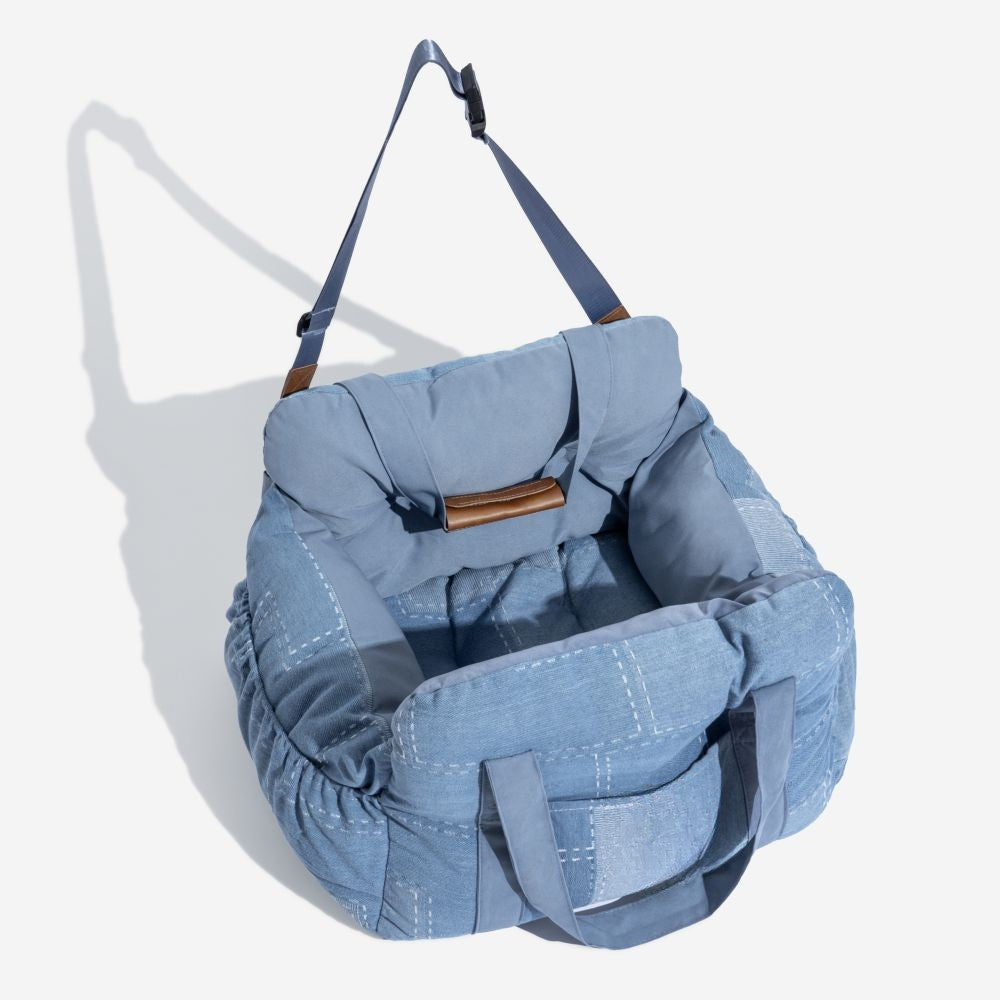 Dog travel accessory: 3-in-1 car seat, carrier, and cozy pet bed. Perfect for safe and happy travel.