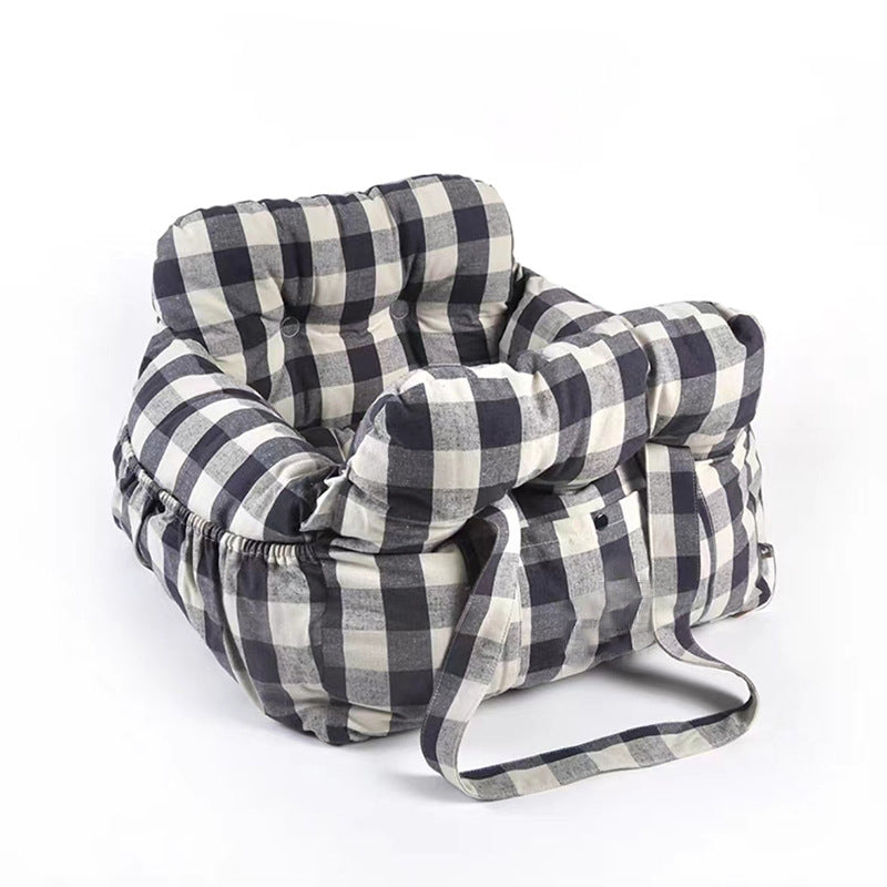 Multi-functional pet travel bed, car safety seat, and portable carrier for comfortable dog journeys.