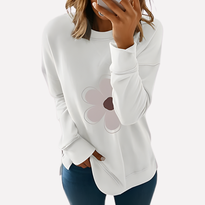 Long sleeve women's relaxed fit crew neck sweatshirt, ideal for everyday loungewear.