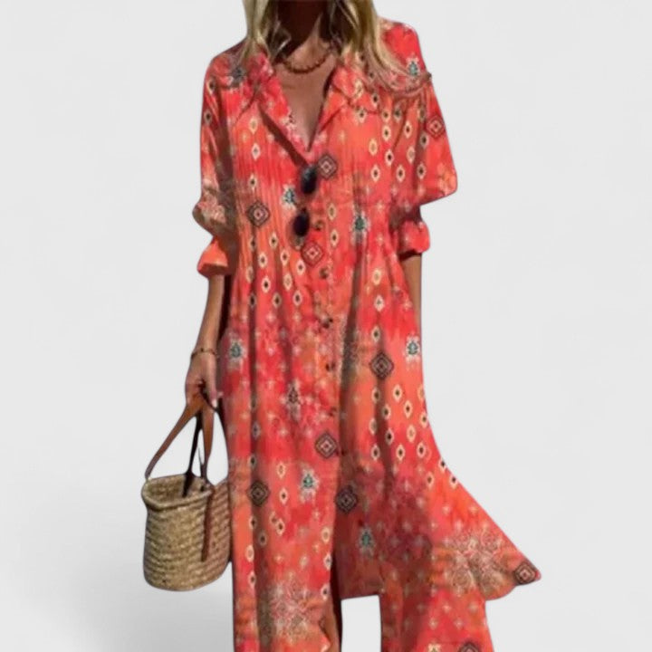 Bohemian style women's long sleeve floral maxi dress with a botanical print, perfect for summer.