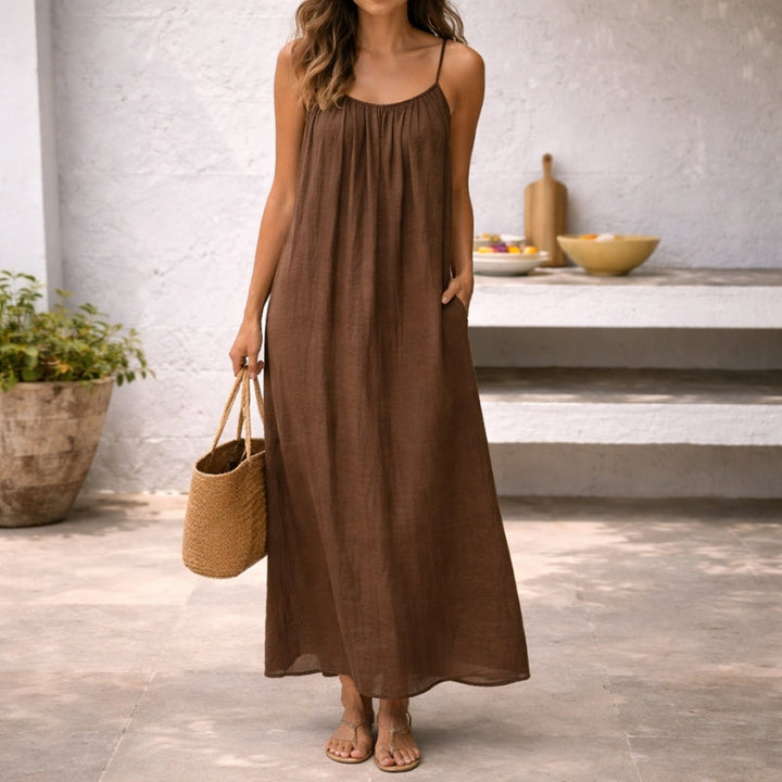 Elegant women's spaghetti strap maxi sundress, perfect for summer fashion & casual wear.