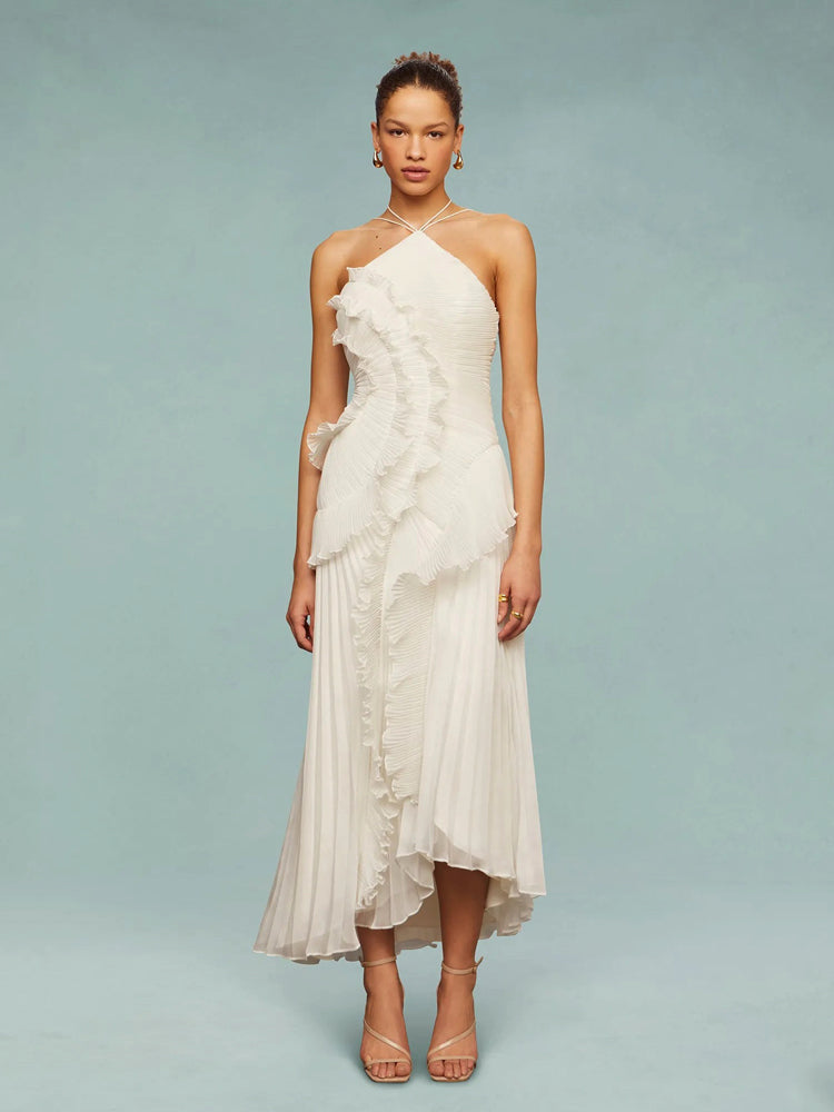Women's elegant sleeveless maxi dress with asymmetric pleats, ideal for wedding guests and special events.