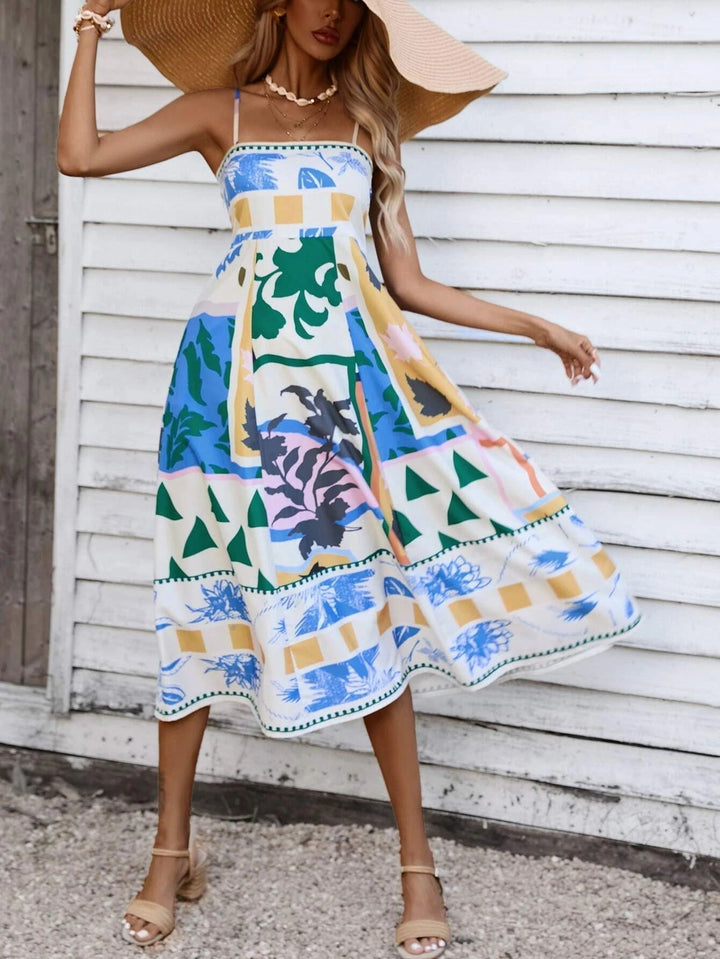 Flowy boho midi dress for women with square neckline, ideal for beachwear or elegant spring outfits.