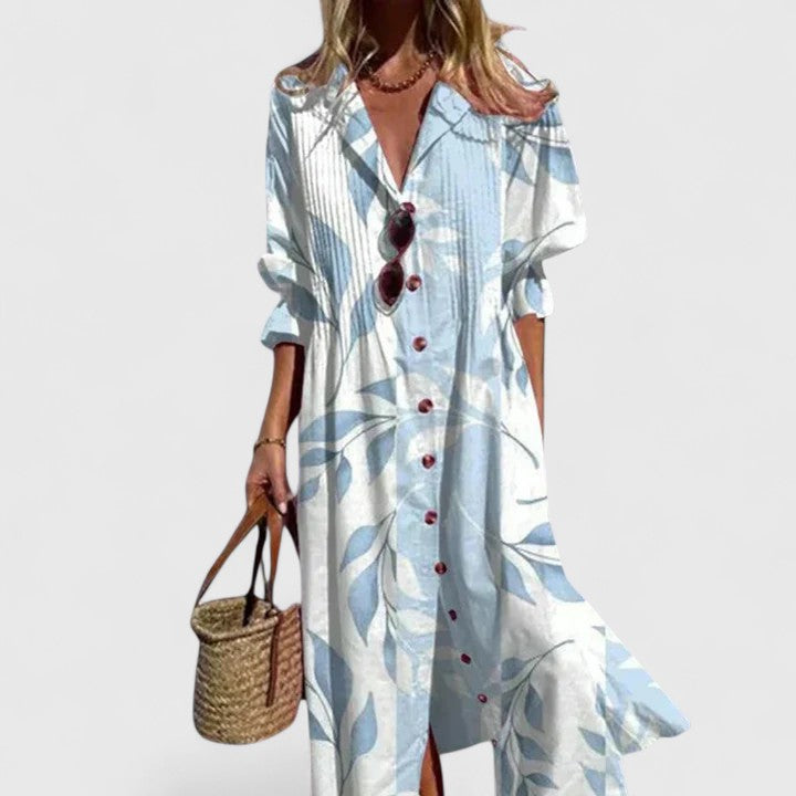 Women's long sleeve boho maxi dress with an effortless botanical print. Flowy and elegant.