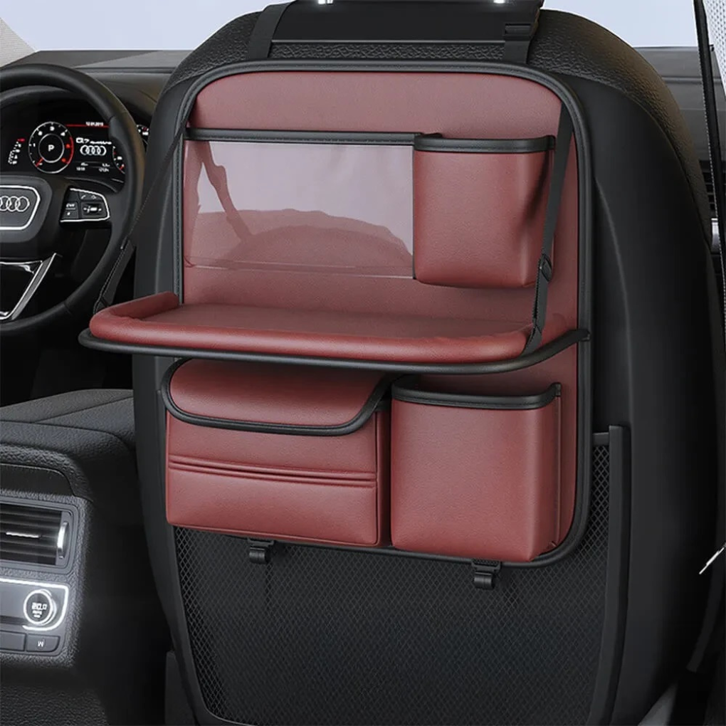 Vehicle back-seat organizer with clear tablet holder and multi-compartment storage pockets.