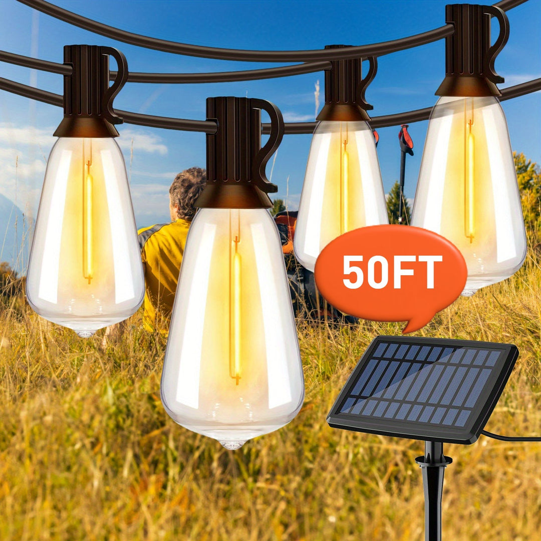 Warm white outdoor solar LED string lights illuminating a cozy patio setting.