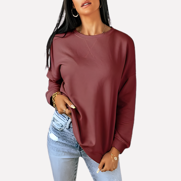 Soft women's relaxed crew neck sweatshirt, ideal for casual style and cozy loungewear.