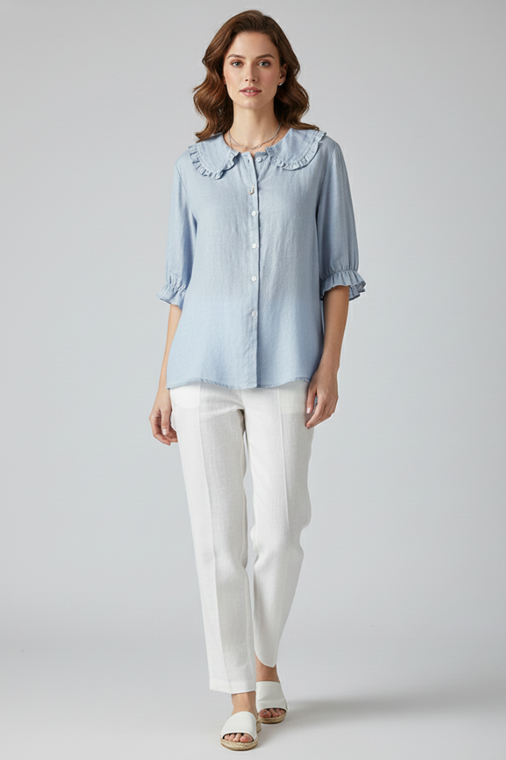 Chic women's button-up shirt featuring a stylish ruffled collar and mid-length sleeves for spring.