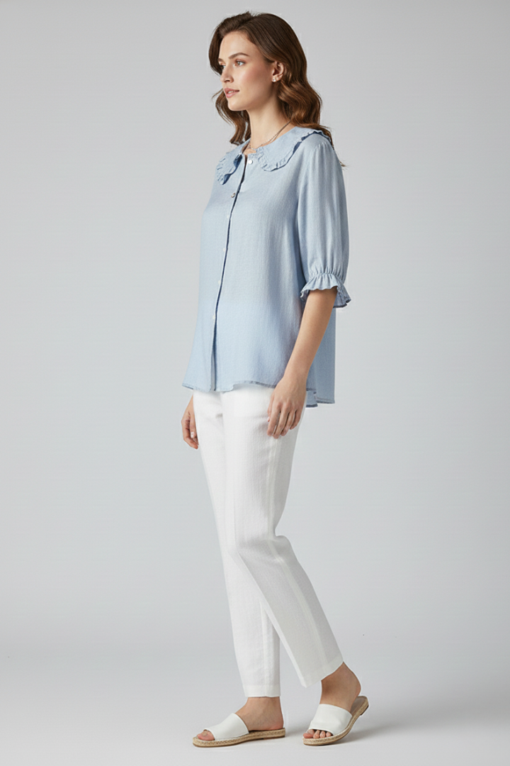Elegant women's shirt with a feminine ruffled collar & button front, a perfect casual chic spring top.
