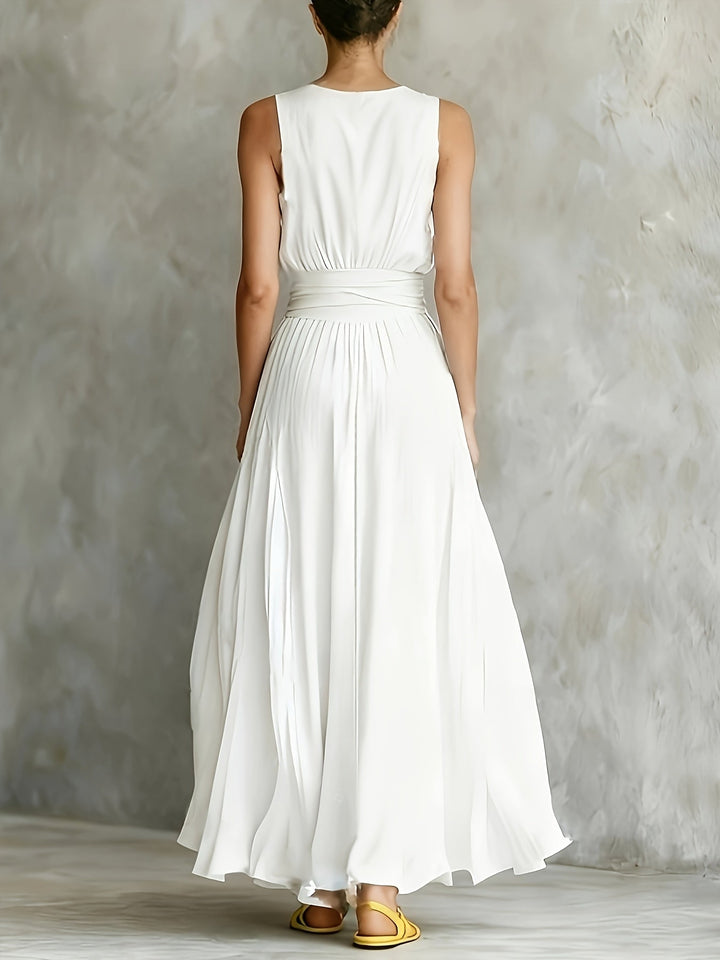 Chic white sleeveless A-line maxi dress for women, featuring a stylish belt. A perfect elegant or casual summer outfit.