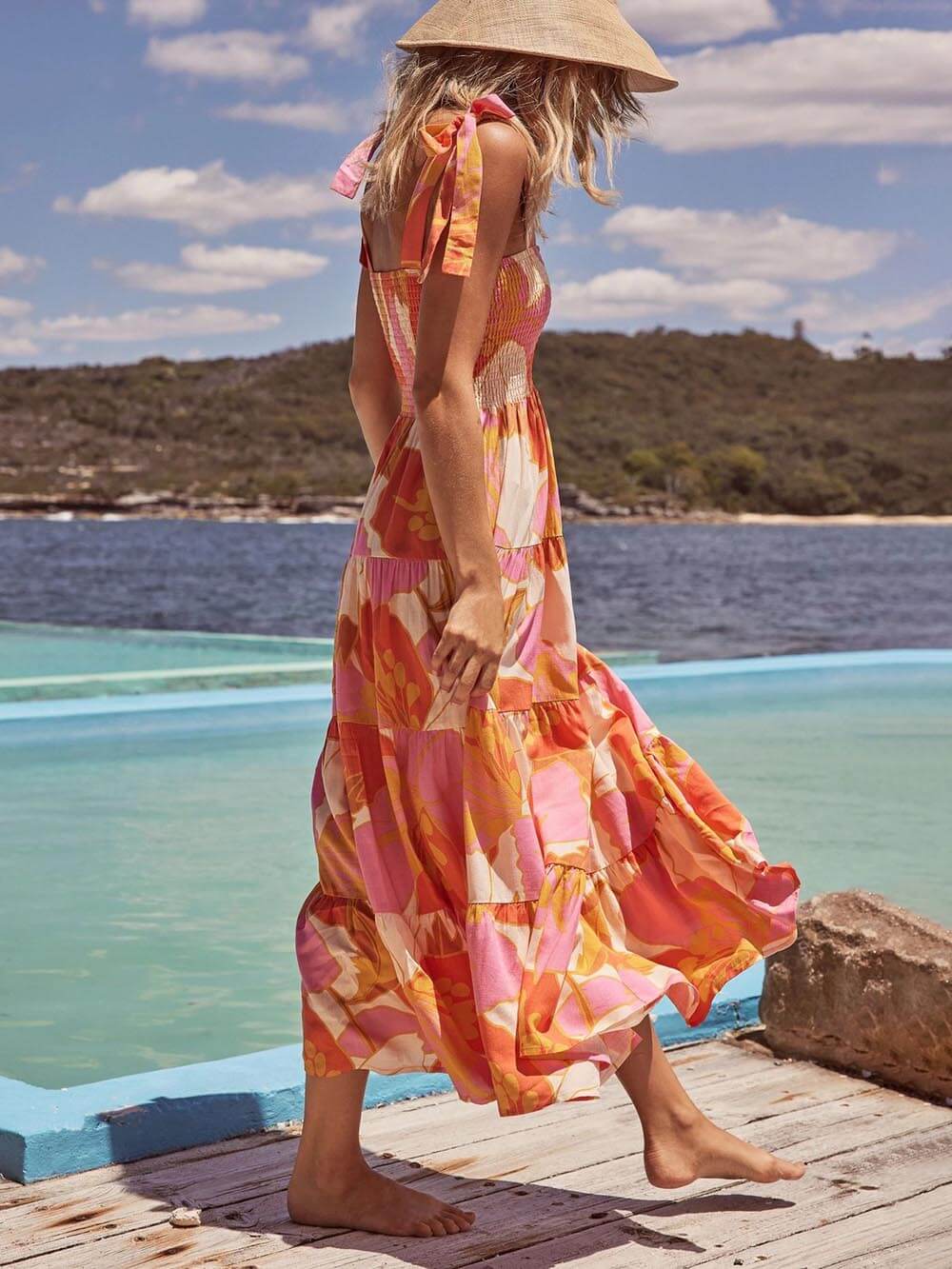Effortless women's summer halter midi sundress in multicolor, great for vacation outfits or casual beachwear.