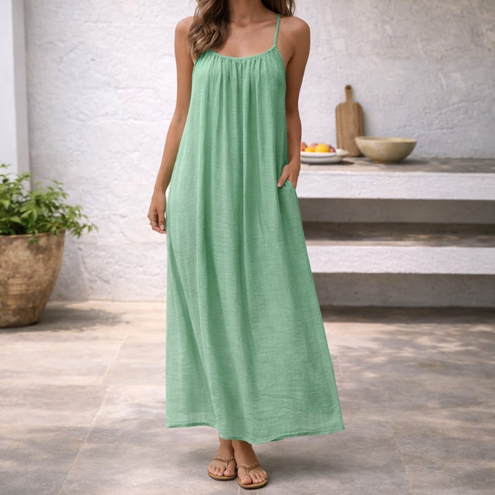 Flattering A-line women's elegant maxi sundress with spaghetti straps, a summer fashion staple.