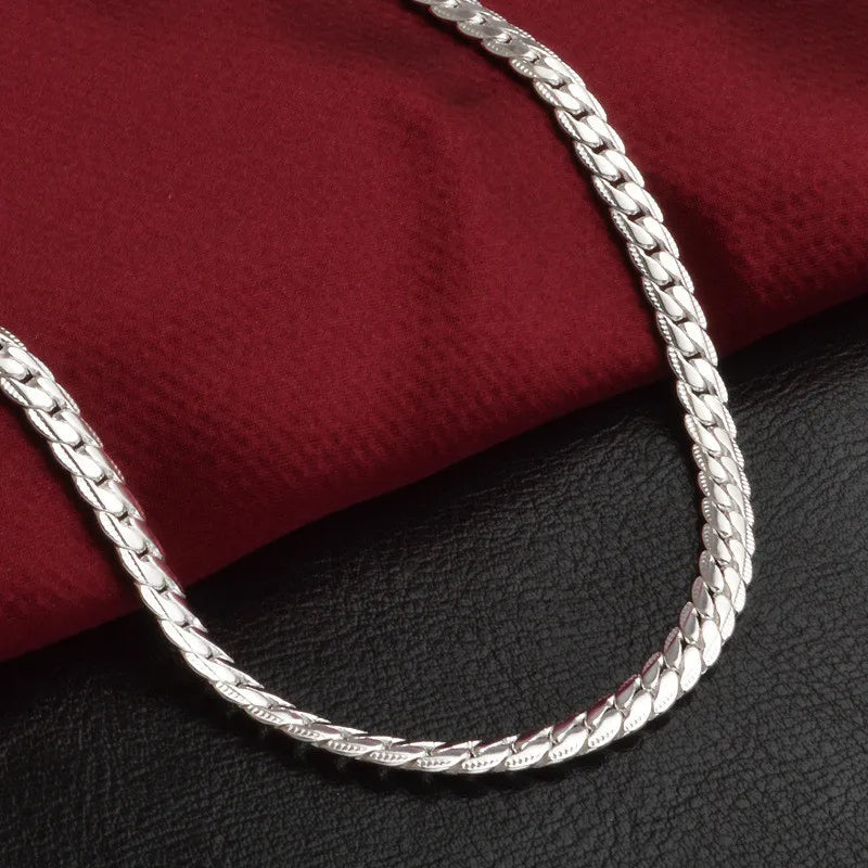 Sparkling 925 sterling silver chain necklace with a lucky pendant, elegant fine jewelry for women's fashion.
