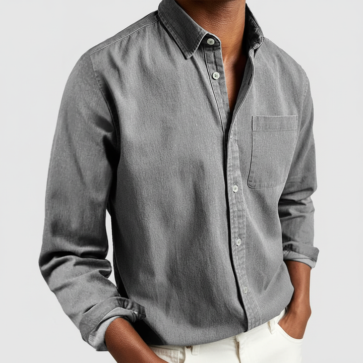 Classic men's button-down shirt with long sleeves. Essential casual or dress wear for men's versatile style.