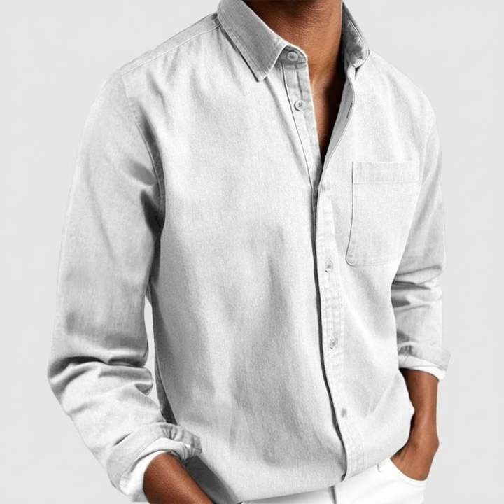 High-quality men's long sleeve button-down casual shirt, a timeless piece of men's apparel for any occasion.
