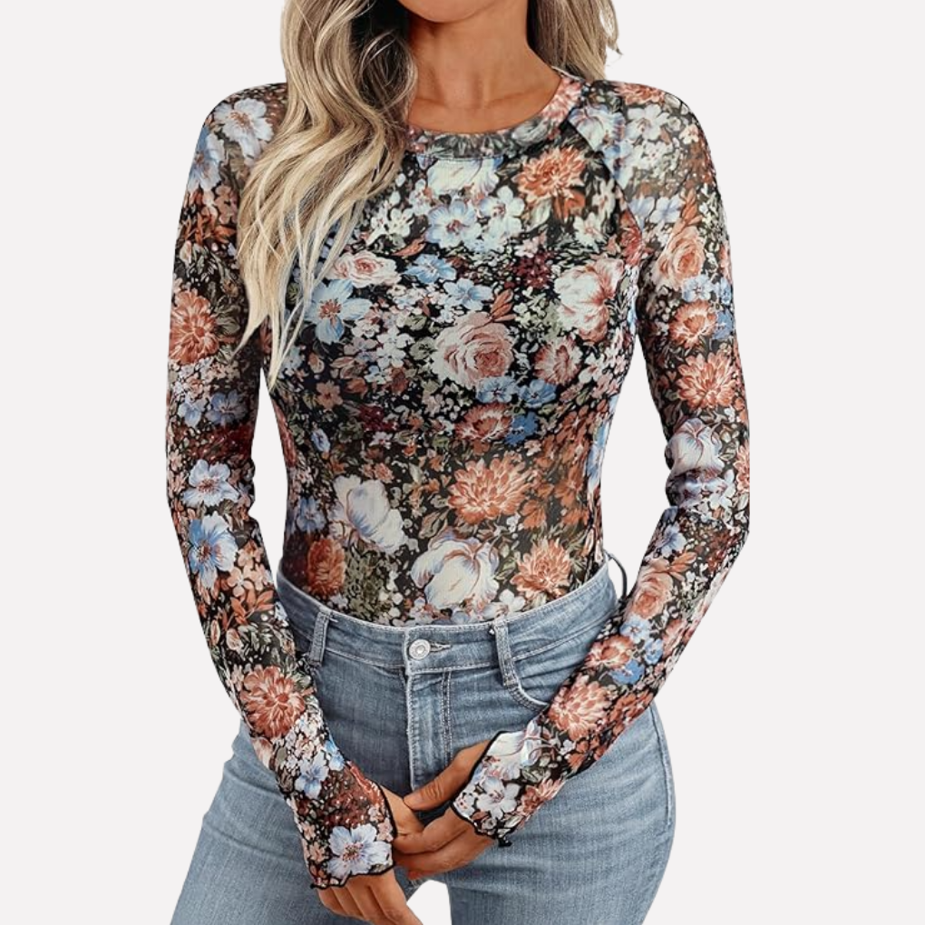 Elegant women's sheer patterned long sleeve top. Chic slim fit blouse with unique design for evening and party wear.