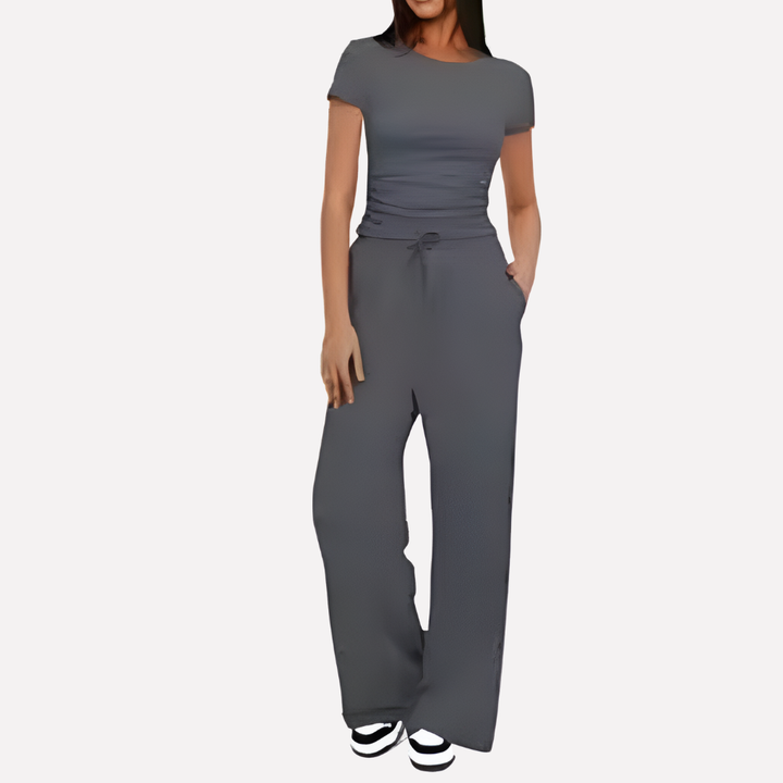 Coordinated women's 2-piece matching lounge set: a comfy crop top & wide leg pants in a soft rayon blend for casual style.