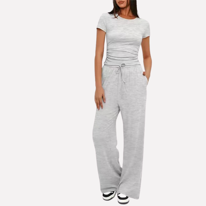 Women's comfort outfit: a 2-piece lounge set with breathable rayon blend wide leg pants & a stylish crop top.