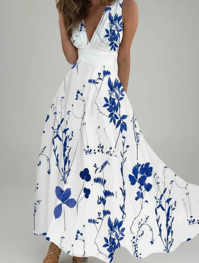 Flowy A-line floral midi dress for women, featuring a flattering V-neck, ideal for casual and elegant wear.
