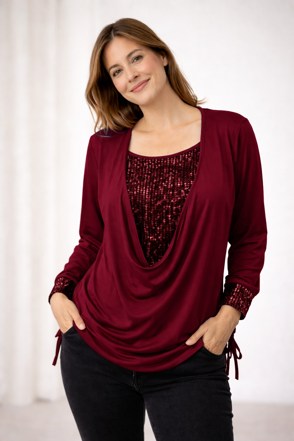 Women's elegant long sleeve sequin blouse, a dazzling party top for glamorous evening wear.