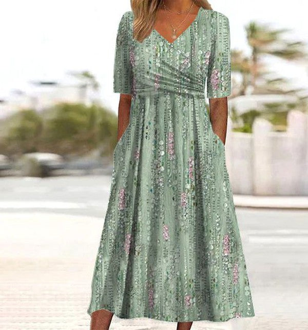 Elegant women's romantic floral A-line midi dress in green, perfect for summer parties & spring brunches.
