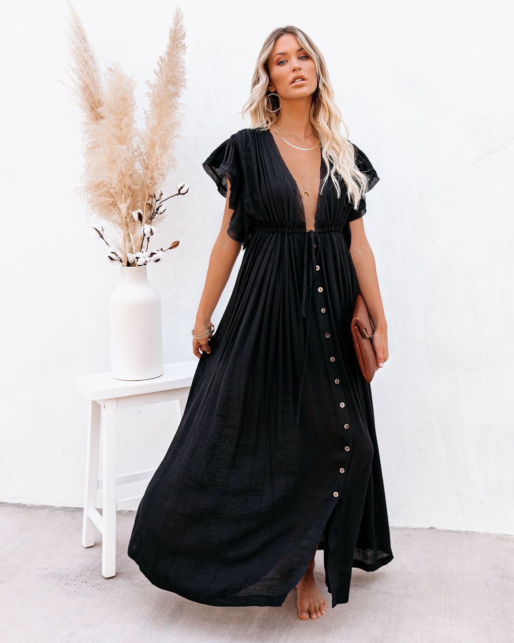 Women's flowy boho maxi dress in a relaxed fit, perfect for summer vacations. Effortlessly elegant bohemian style.