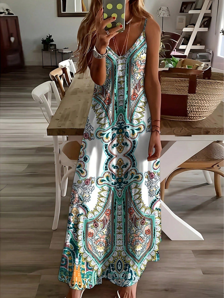 Elegant women's bohemian maxi dress with a V-neck and intricate paisley print, a summer wardrobe essential.