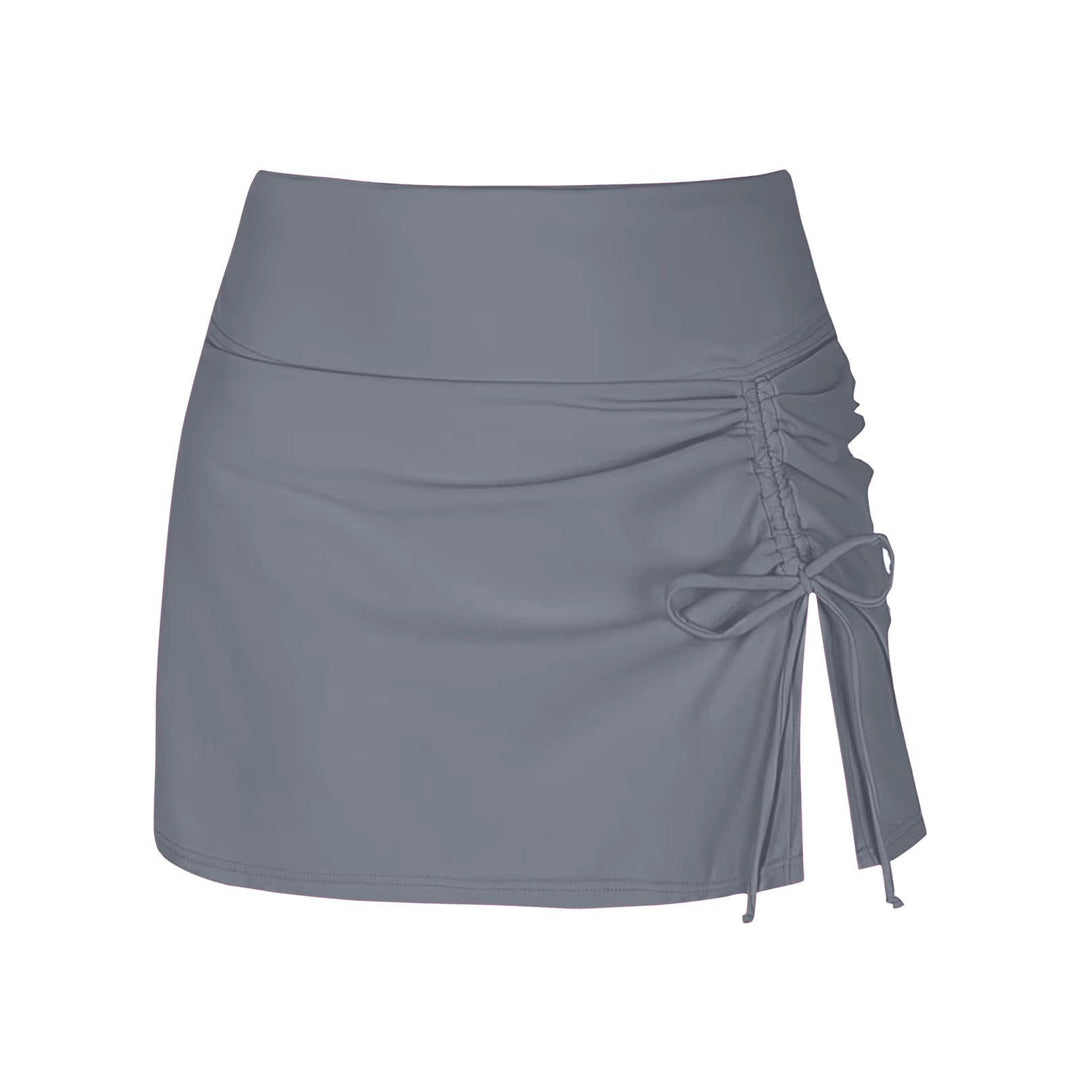 Women's high-waist swim skirt with flattering ruching. Great for beach, poolside, and summer vacation.