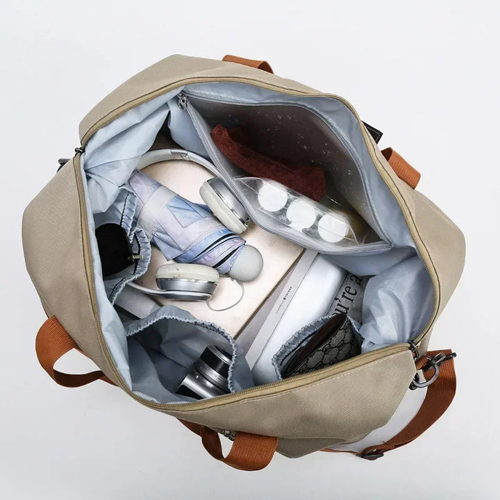Versatile women's travel duffel bag. Large capacity, wet/dry compartment. Perfect for gym, sports, or a weekend getaway.