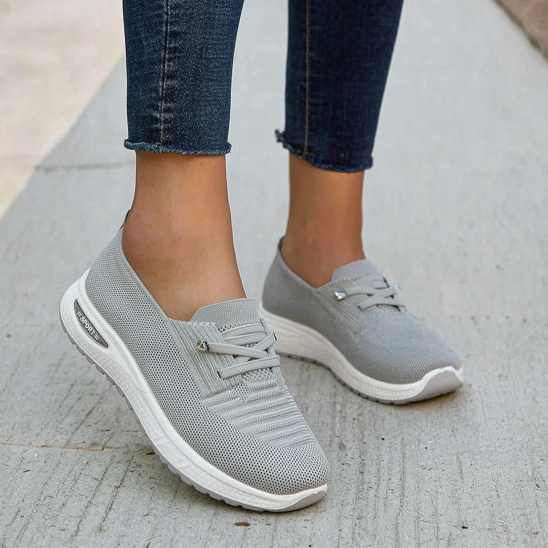 Women's orthopedic slip-on trainers, cushioned with arch support for comfortable everyday walking. Lightweight design.