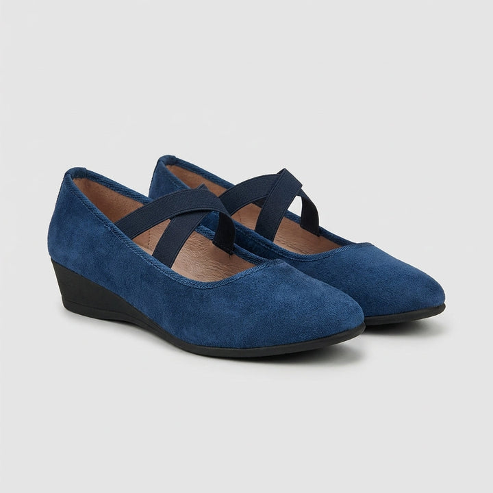 Front view of women's stylish criss-cross wedge flats, designed for all-day orthopedic comfort & summer wear.