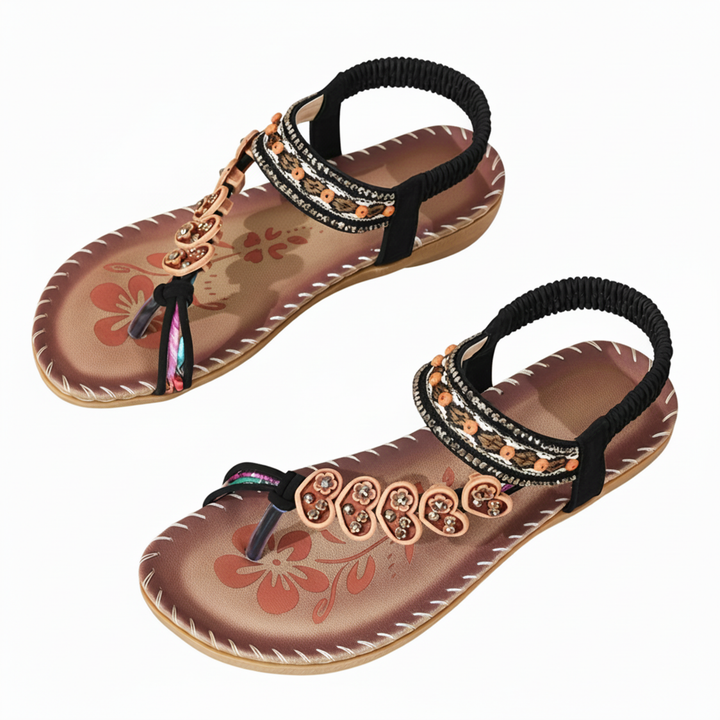 Stylish women's bohemian thong sandals featuring a vibrant floral design & chic ankle strap for trendy summer outfits.