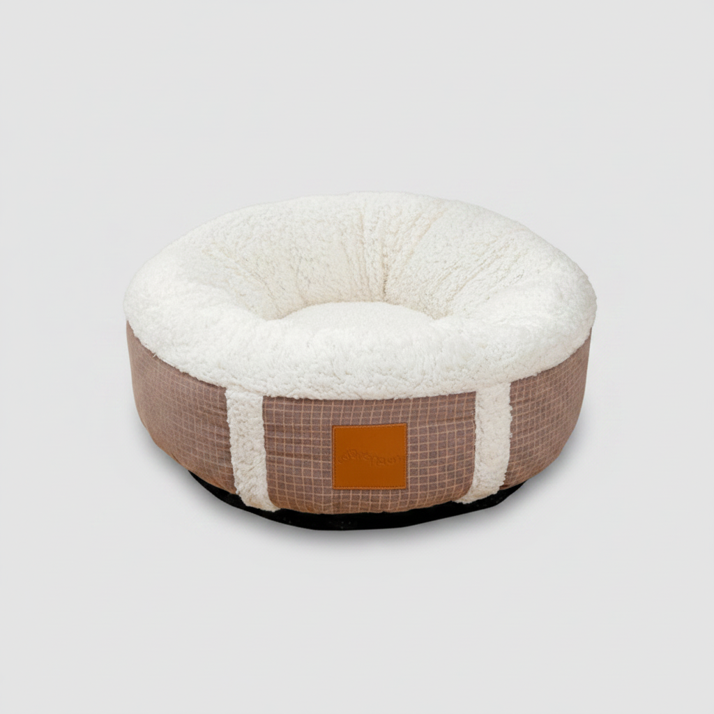 Plush, super-soft pet bed for cozy winter sleep. Washable calming dog & cat nest, ideal for indoor small pets.