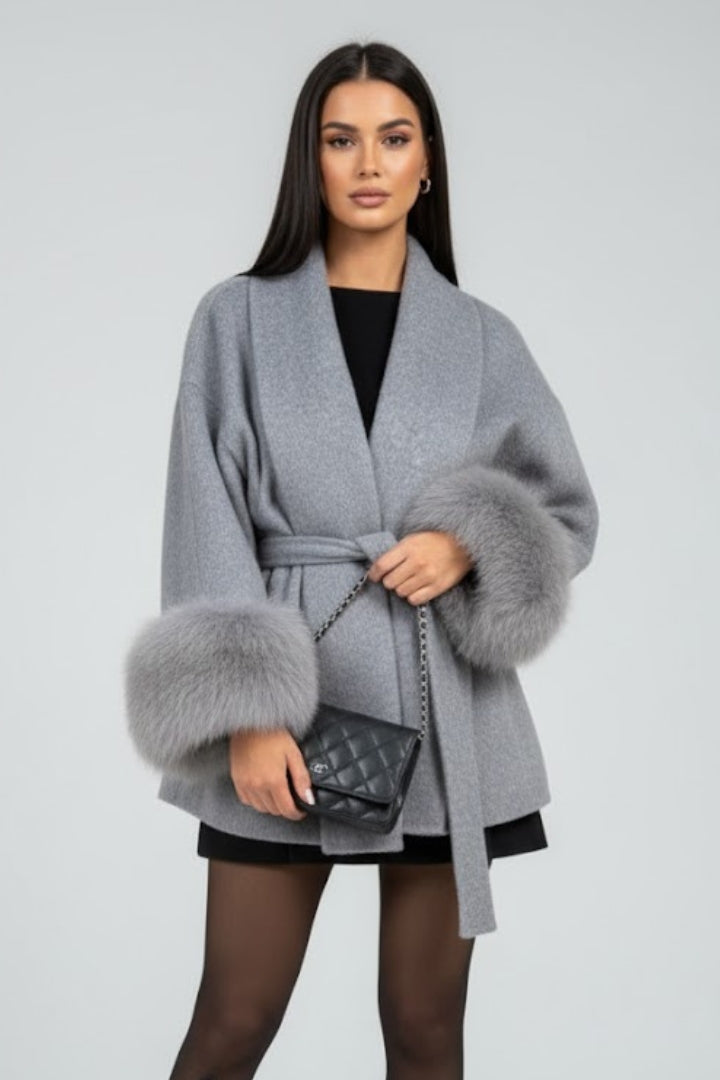 Sophisticated women's full-length belted winter coat, designed with elegant faux fur cuffs for ultimate style.