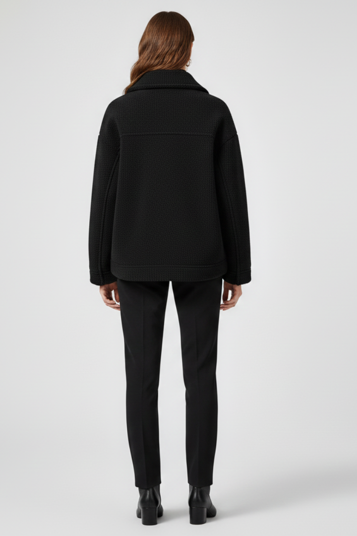 Women's fleece jacket, button-front design with large pockets for warmth and casual everyday style.