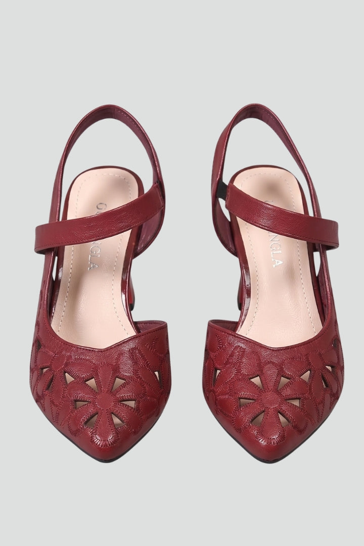 Elegant black women's buckle heels with adjustable strap, cushioned for comfortable evening wear.