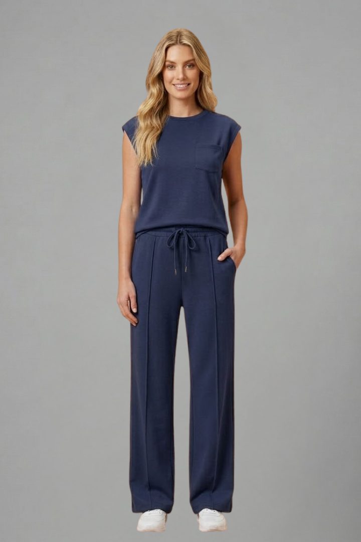 Chic women's casual loungewear set, featuring a short sleeve tee and comfy elastic waist shorts for relaxation.